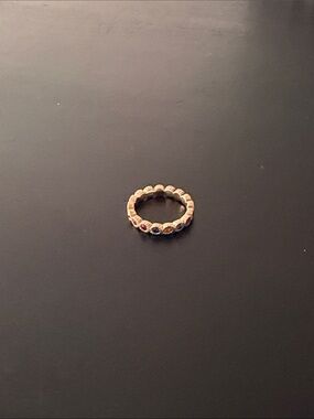 Delicate Rose Gold Eternity Ring with Multicolored Gem Accents